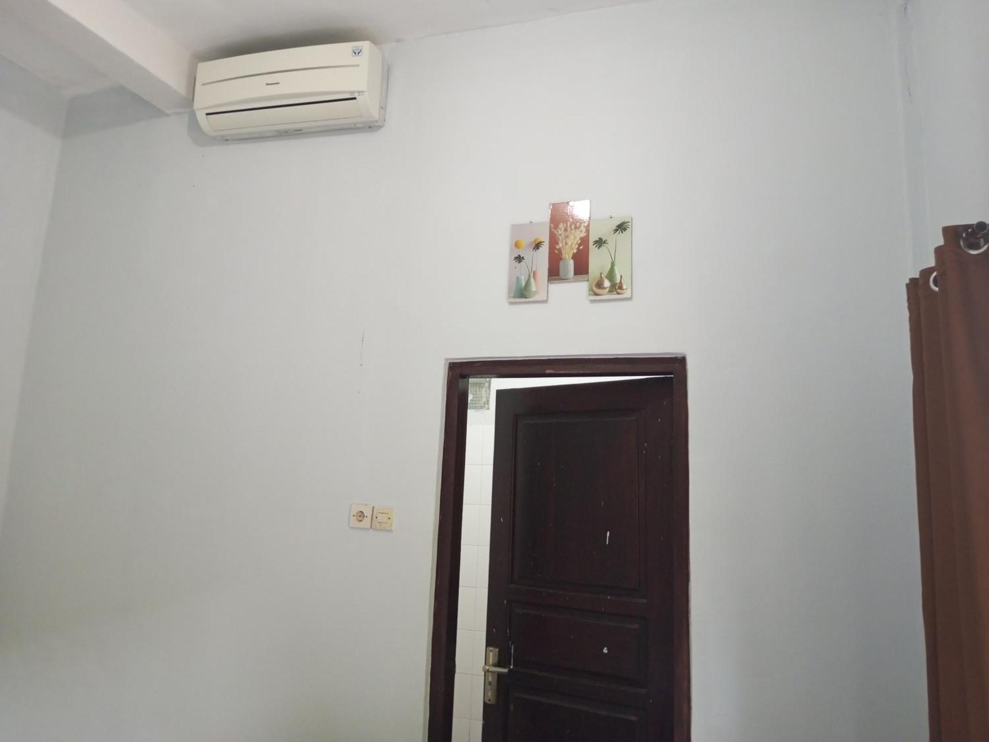 Kri Homestay Kuta  객실 사진